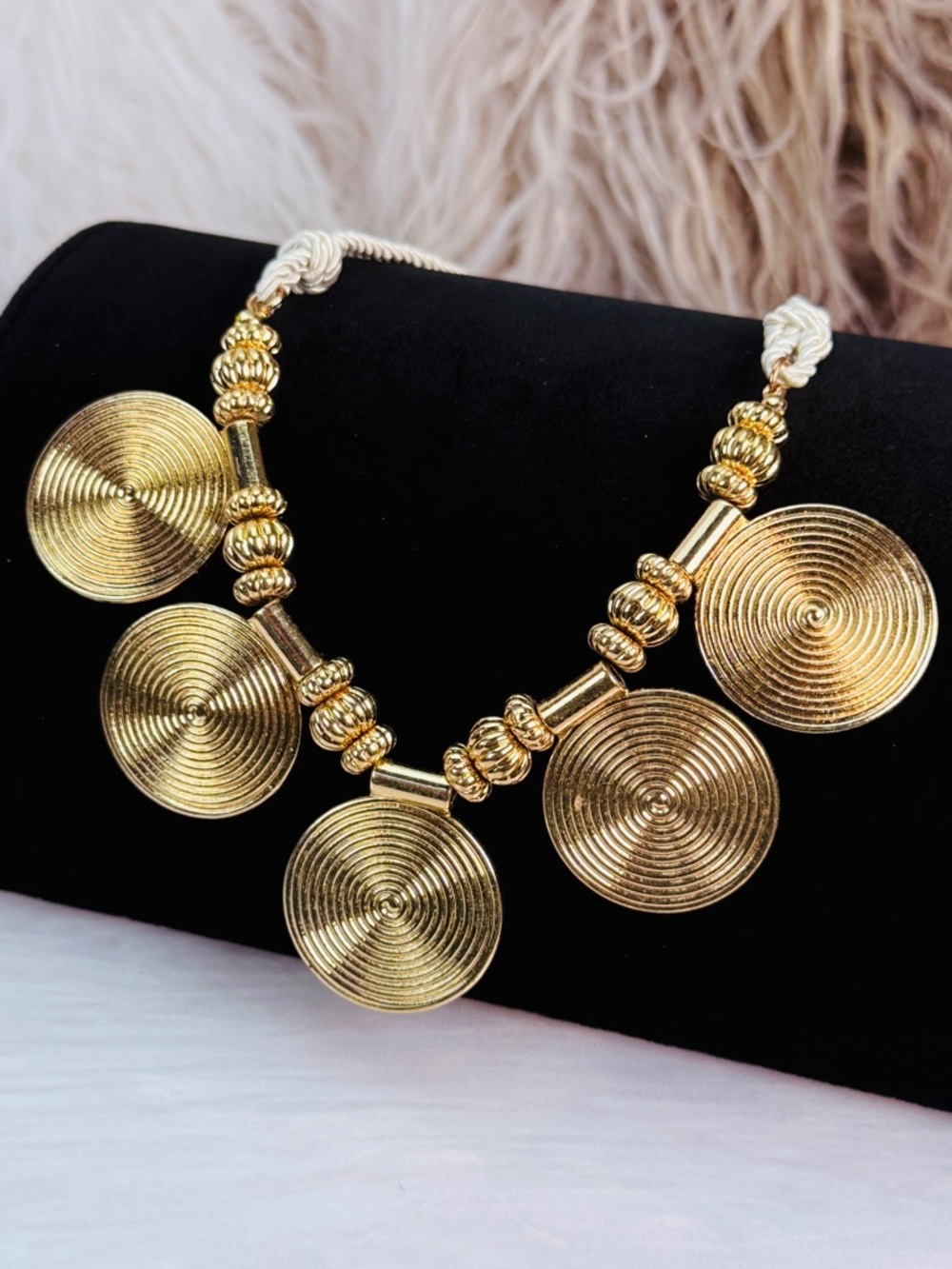 Pretty goldtone, ivory rope statement necklace
